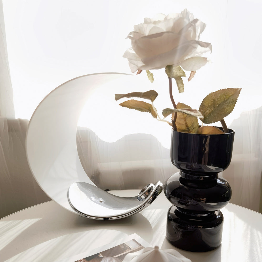 Liora Curved Table Lamp With Elegant Swirls And Soft Glow