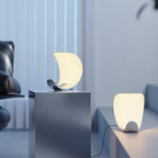Liora Curved Table Lamp With Elegant Swirls And Soft Glow