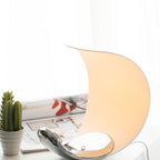 Liora Curved Table Lamp With Elegant Swirls And Soft Glow