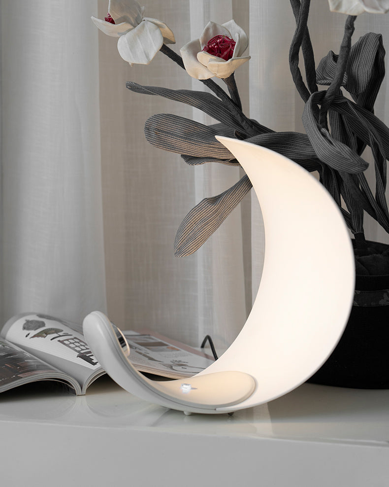 Liora Curved Table Lamp With Elegant Swirls And Soft Glow