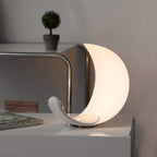 Liora Curved Table Lamp With Elegant Swirls And Soft Glow