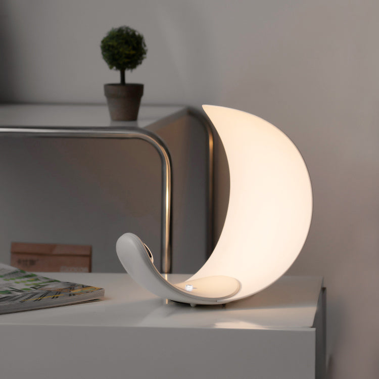 Liora Curved Table Lamp With Elegant Swirls And Soft Glow
