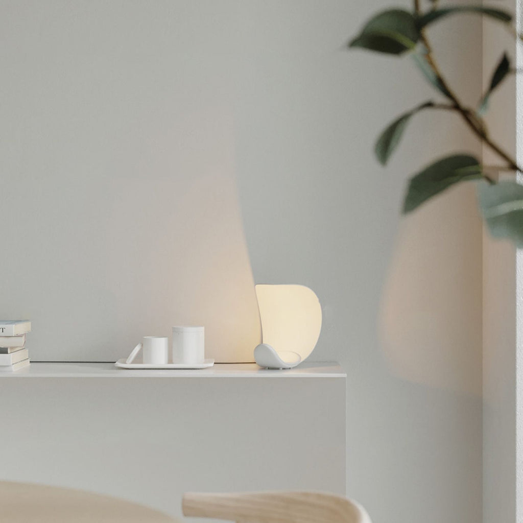 Liora Curved Table Lamp With Elegant Swirls And Soft Glow