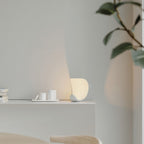 Liora Curved Table Lamp With Elegant Swirls And Soft Glow