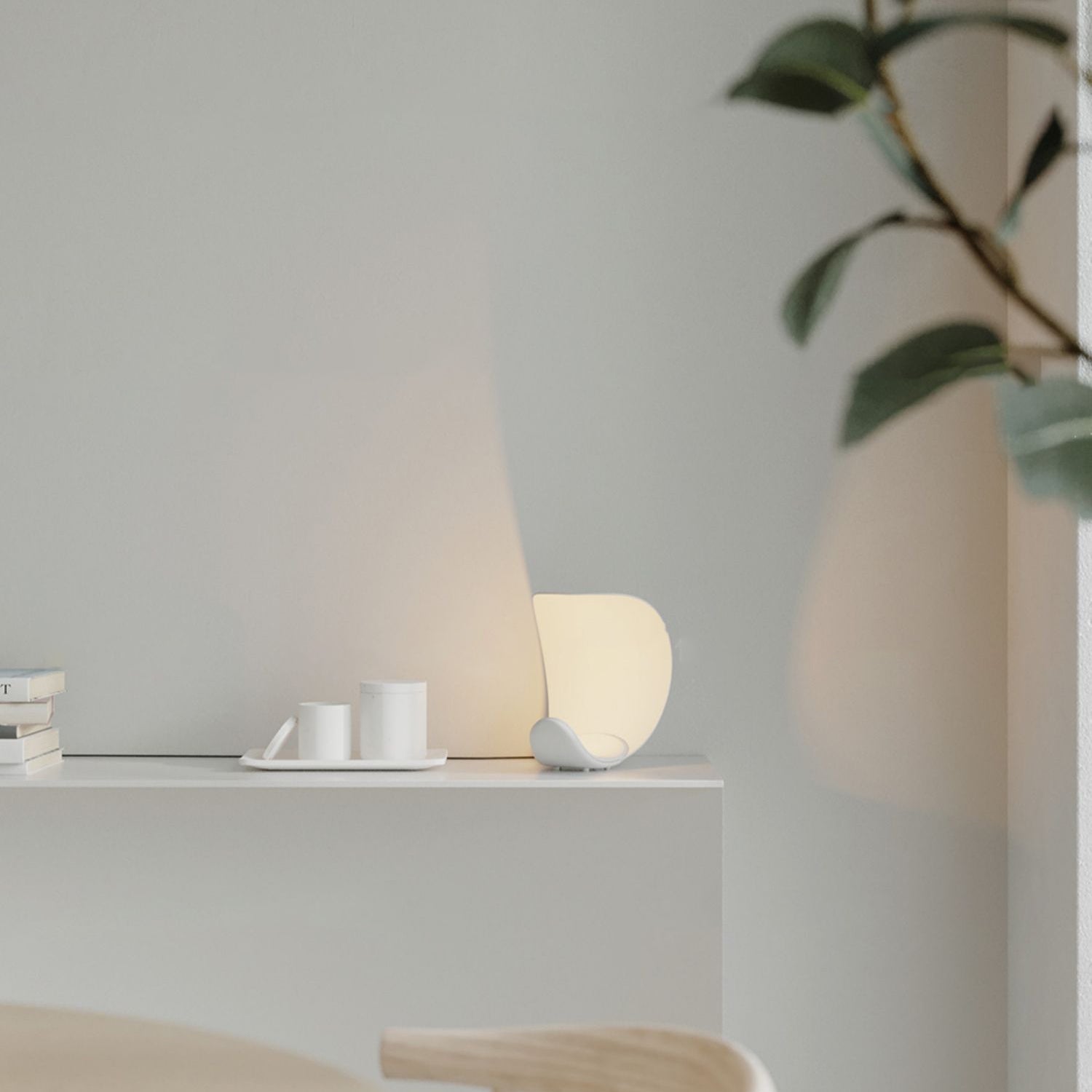 Liora Curved Table Lamp With Elegant Swirls And Soft Glow