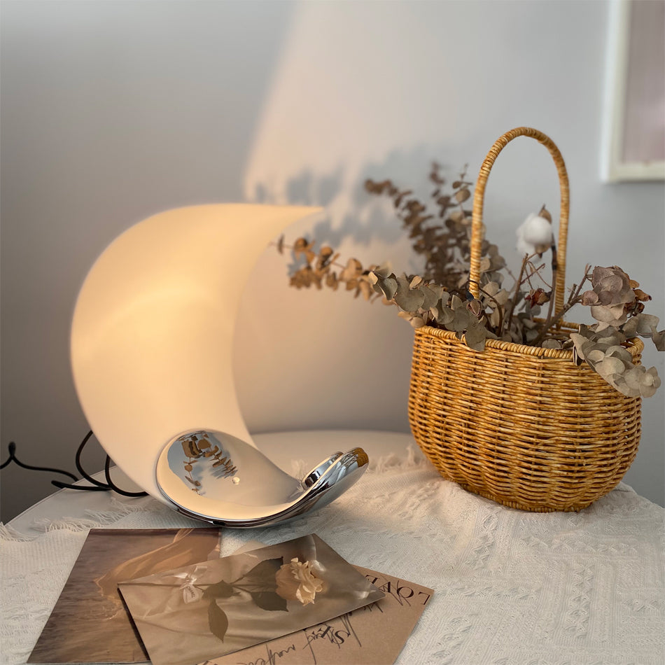 Liora Curved Table Lamp With Elegant Swirls And Soft Glow