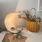 Liora Curved Table Lamp With Elegant Swirls And Soft Glow