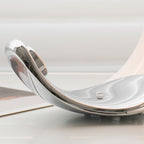 Liora Curved Table Lamp With Elegant Swirls And Soft Glow