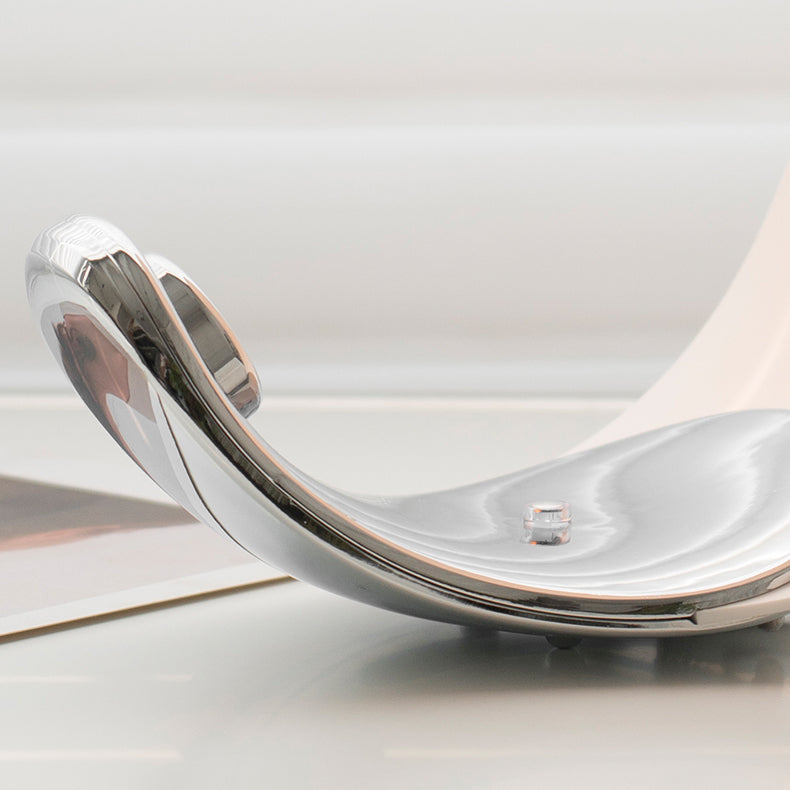 Liora Curved Table Lamp With Elegant Swirls And Soft Glow