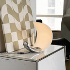 Liora Curved Table Lamp With Elegant Swirls And Soft Glow