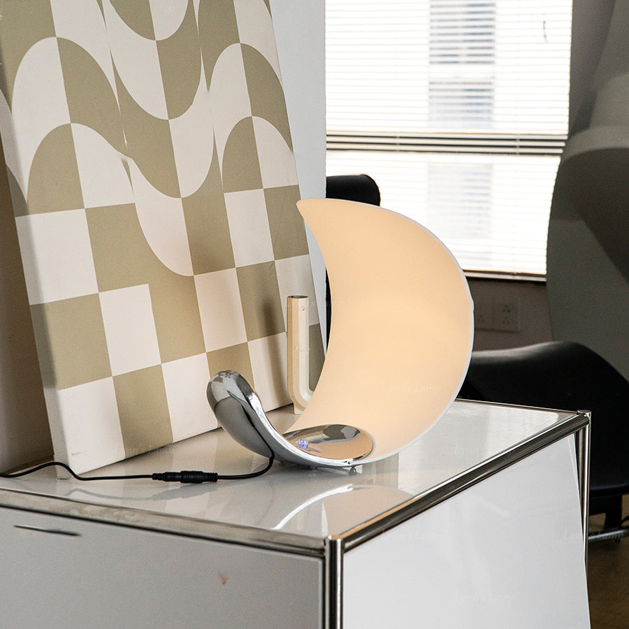 Liora Curved Table Lamp With Elegant Swirls And Soft Glow