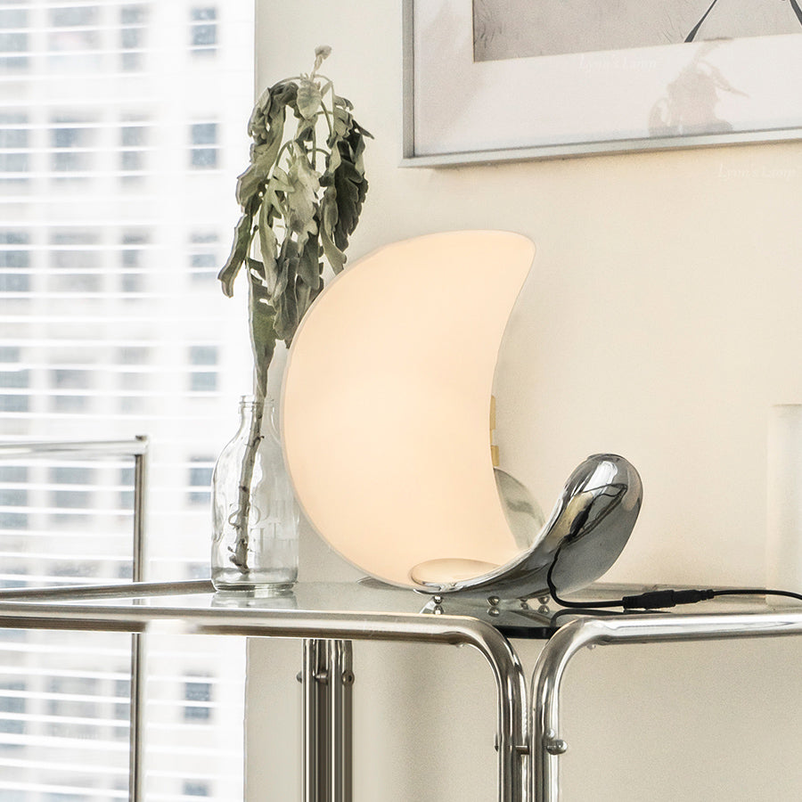 Liora Curved Table Lamp With Elegant Swirls And Soft Glow