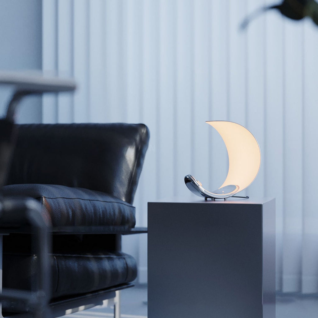 Liora Curved Table Lamp With Elegant Swirls And Soft Glow