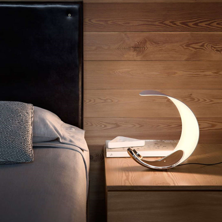 Liora Curved Table Lamp With Elegant Swirls And Soft Glow
