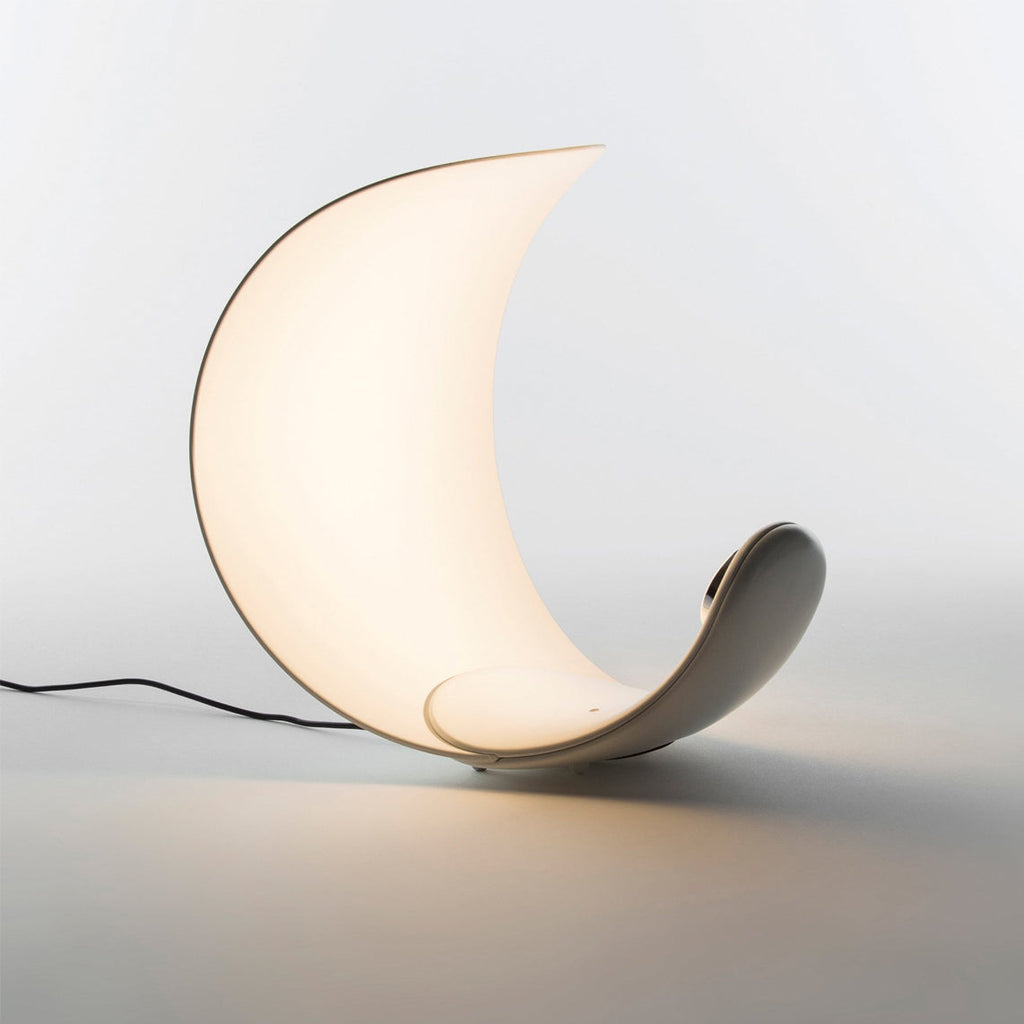 Liora Curved Table Lamp With Elegant Swirls And Soft Glow