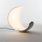 Liora Curved Table Lamp With Elegant Swirls And Soft Glow