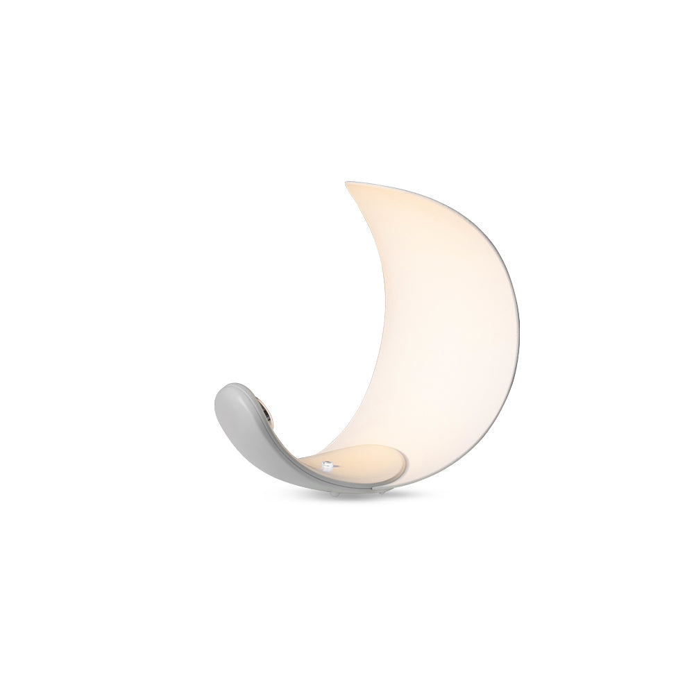 Liora Curved Table Lamp With Elegant Swirls And Soft Glow