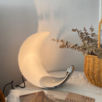 Liora Curved Table Lamp With Elegant Swirls And Soft Glow