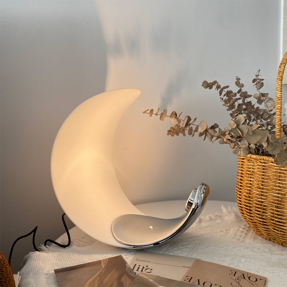 Liora Curved Table Lamp With Elegant Swirls And Soft Glow