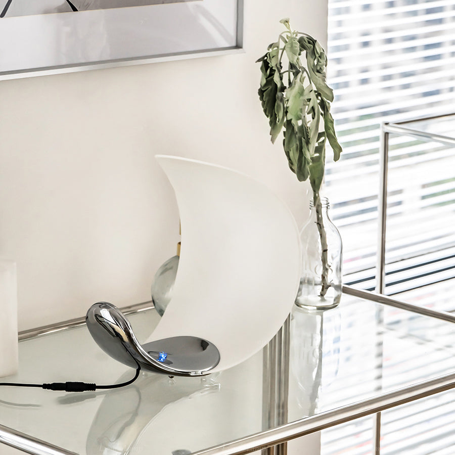 Liora Curved Table Lamp With Elegant Swirls And Soft Glow