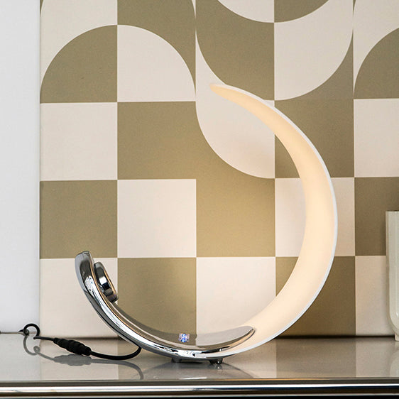 Liora Curved Table Lamp With Elegant Swirls And Soft Glow