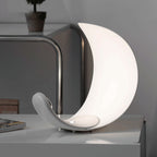 Liora Curved Table Lamp With Elegant Swirls And Soft Glow