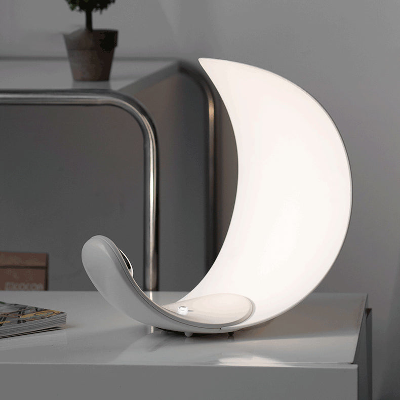 Liora Curved Table Lamp With Elegant Swirls And Soft Glow