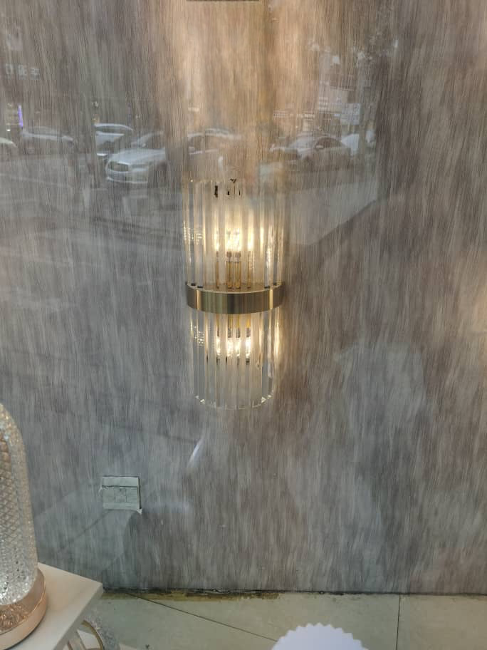 LumaLuxe Elegant Gold Wall Sconce With Warm Ambient Glow