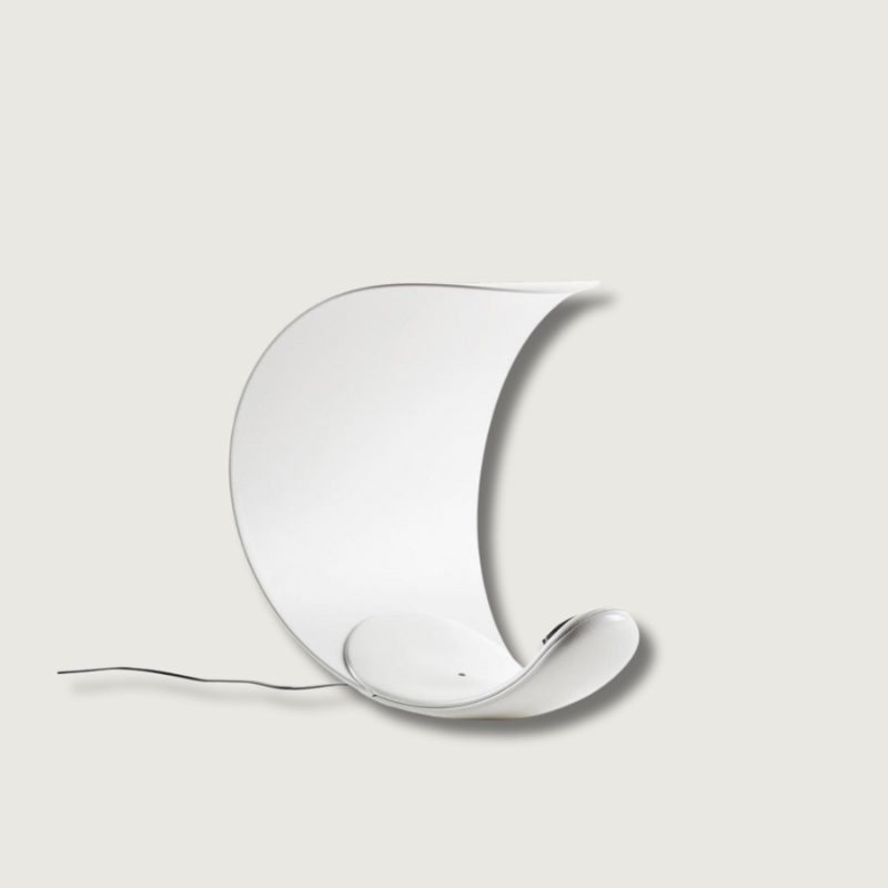 Liora Curved Table Lamp With Elegant Swirls And Soft Glow