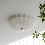 LuminaPetal Ceiling Lamp With Organic Curves And Warm Glow
