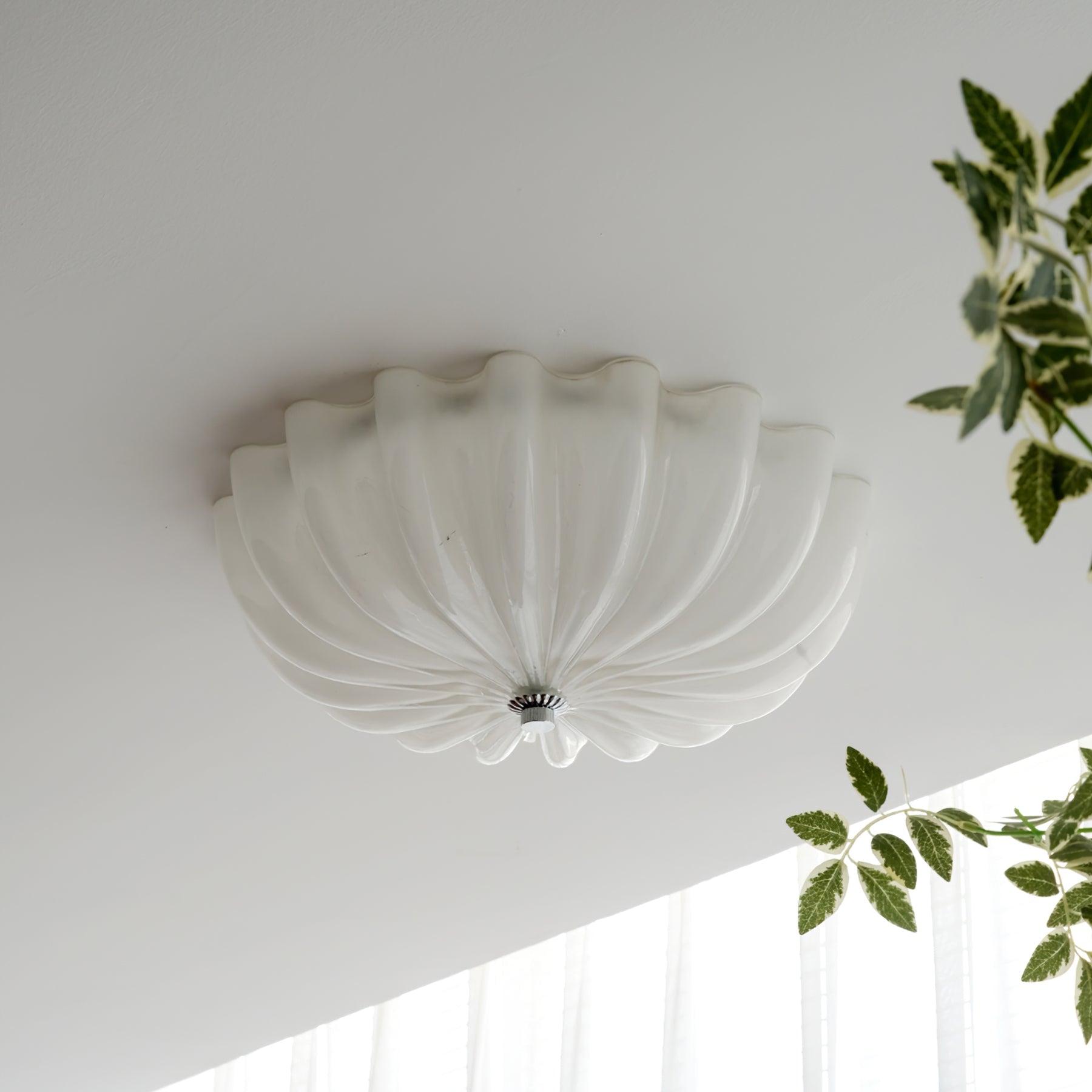 LuminaPetal Ceiling Lamp With Organic Curves And Warm Glow
