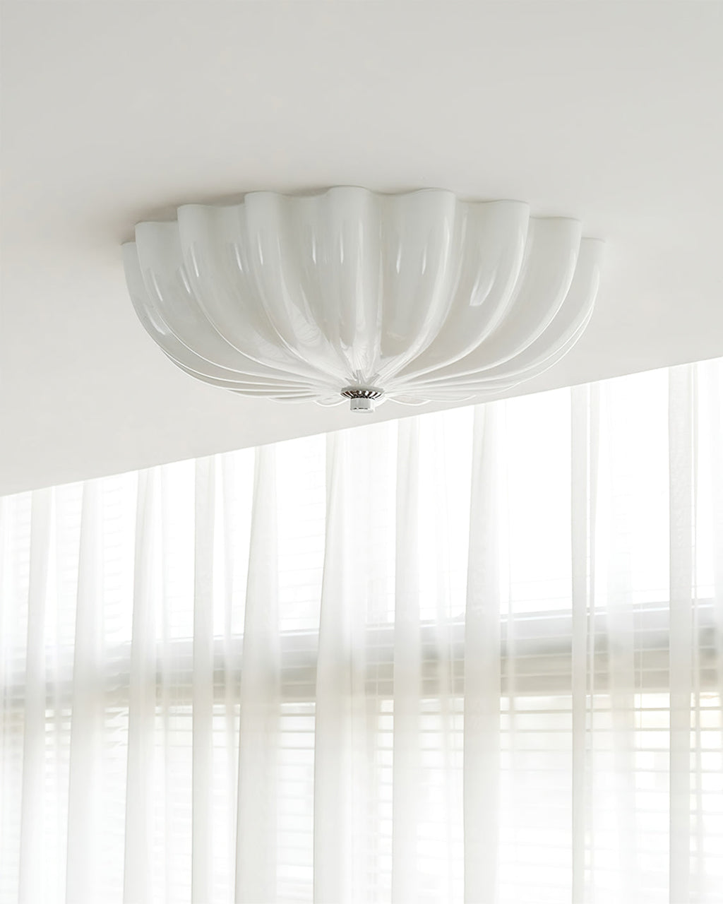 LuminaPetal Ceiling Lamp With Organic Curves And Warm Glow