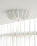 LuminaPetal Ceiling Lamp With Organic Curves And Warm Glow