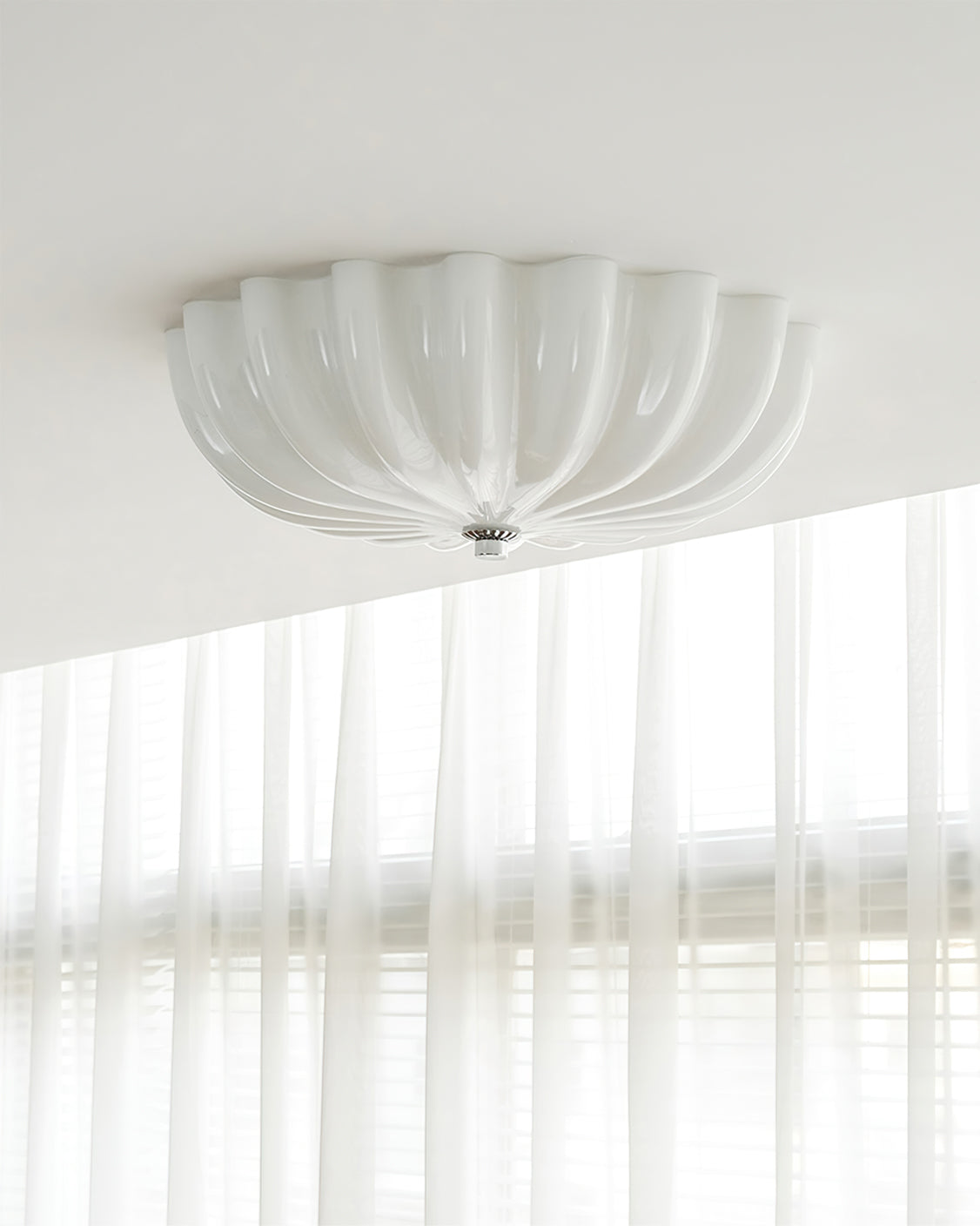LuminaPetal Ceiling Lamp With Organic Curves And Warm Glow