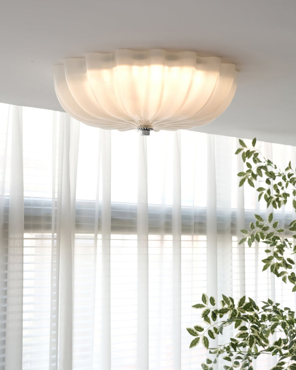LuminaPetal Ceiling Lamp With Organic Curves And Warm Glow