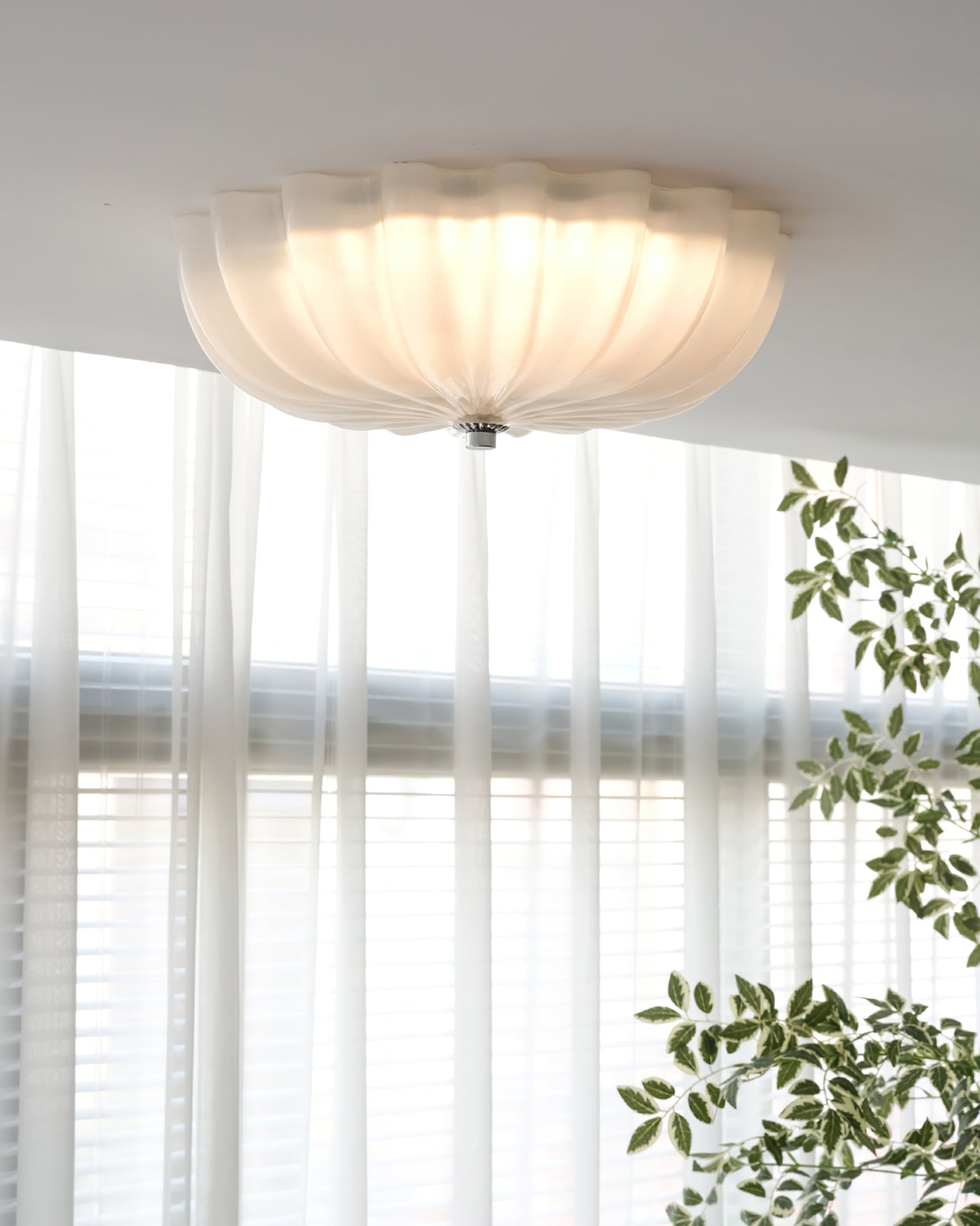 LuminaPetal Ceiling Lamp With Organic Curves And Warm Glow