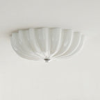 LuminaPetal Ceiling Lamp With Organic Curves And Warm Glow