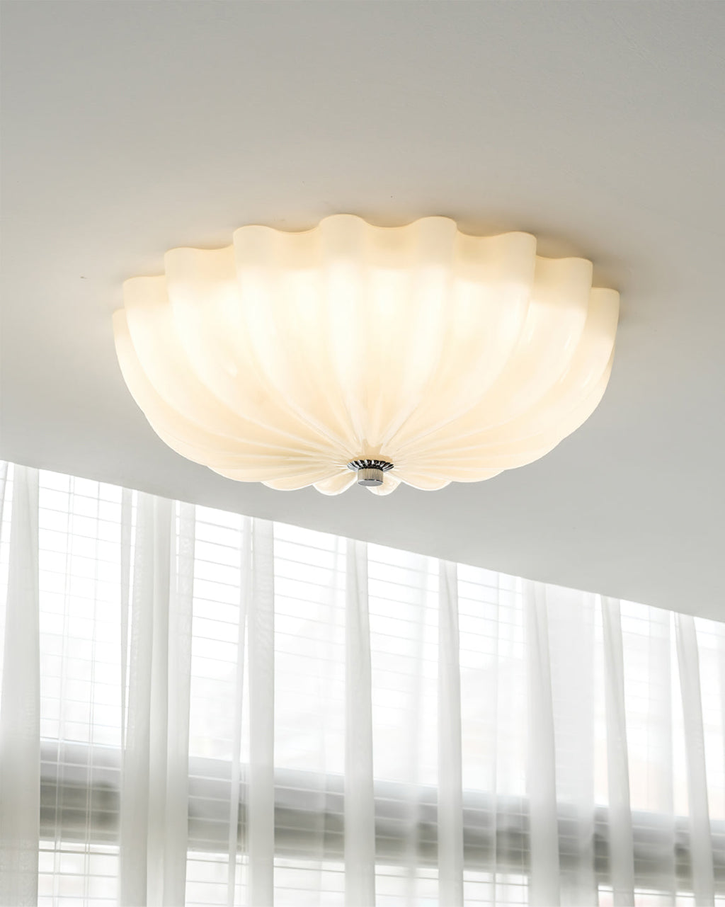LuminaPetal Ceiling Lamp With Organic Curves And Warm Glow