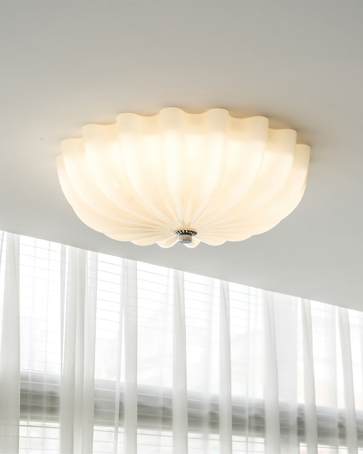 LuminaPetal Ceiling Lamp With Organic Curves And Warm Glow