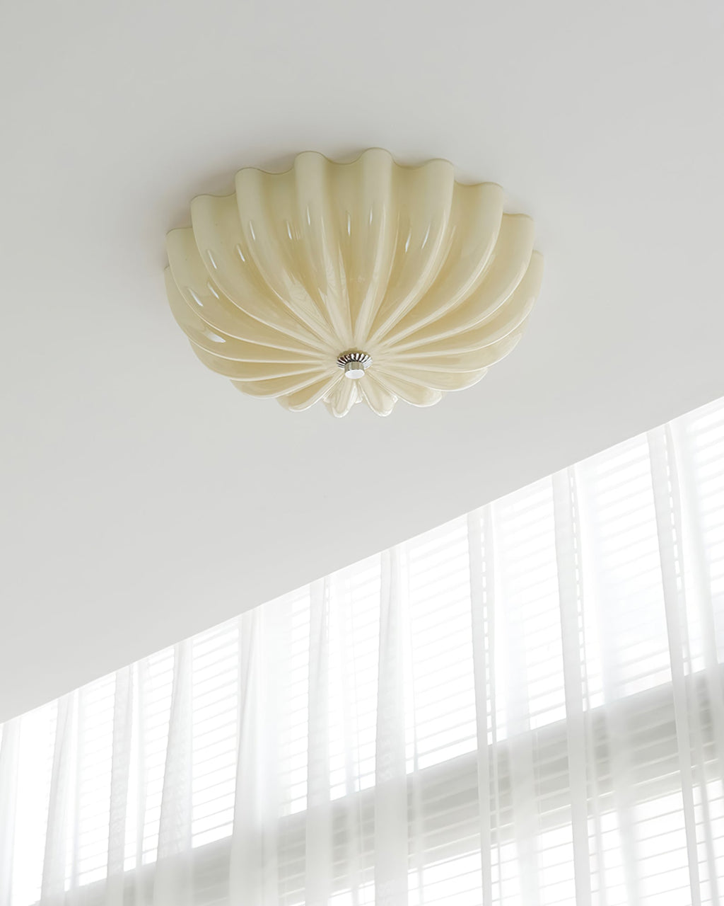 LuminaPetal Ceiling Lamp With Organic Curves And Warm Glow